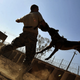 Image for article titled 26 Awesome Photos of War Dogs Showing How Badass and Cute They Can Be